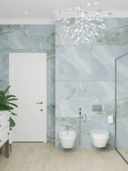 Лёгкость, естественность и деликатная эстетика - всё это соединилось в этом уютном проекте душевой. 02