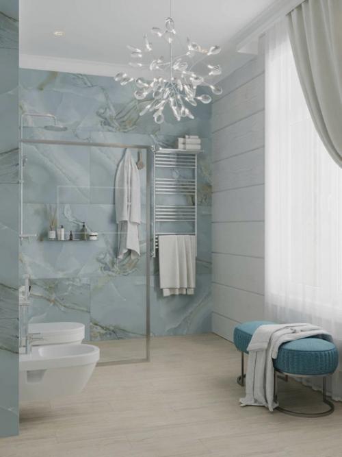 Лёгкость, естественность и деликатная эстетика - всё это соединилось в этом уютном проекте душевой. 08