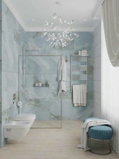 Лёгкость, естественность и деликатная эстетика - всё это соединилось в этом уютном проекте душевой. 05