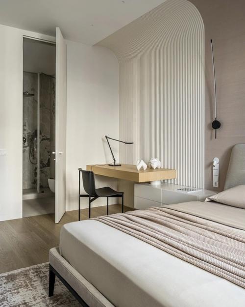 Интерьер этой квартиры - пример того, как минимализм может быть по-настоящему тёплым и уютным. 08