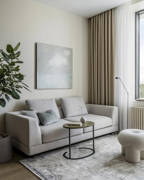 Интерьер этой квартиры - пример того, как минимализм может быть по-настоящему тёплым и уютным. 01