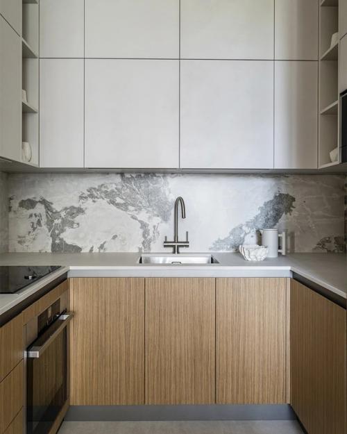 Интерьер этой квартиры - пример того, как минимализм может быть по-настоящему тёплым и уютным. 04