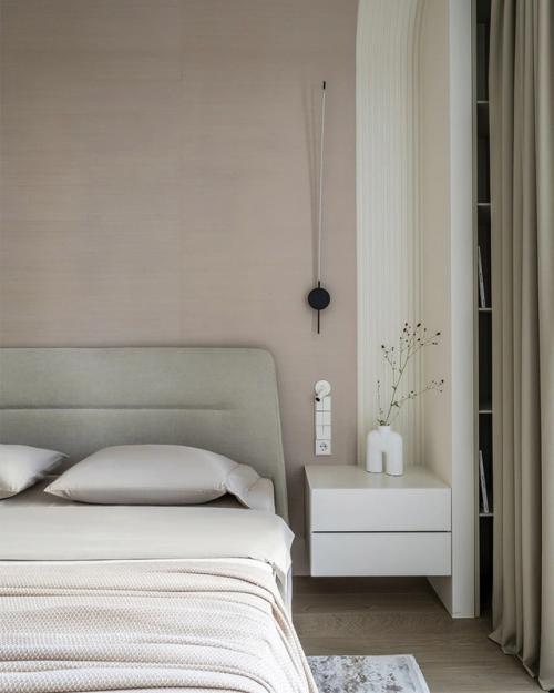 Интерьер этой квартиры - пример того, как минимализм может быть по-настоящему тёплым и уютным. 05