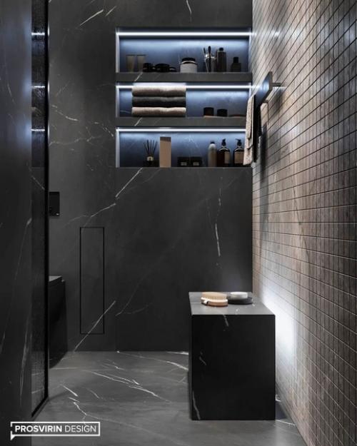 Дизайн санузла в темных оттенках сморится очень стильно и смело. 09
