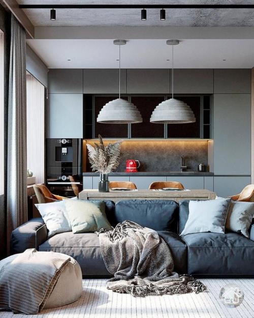 Брутальный интерьер кухни - гостиной для семейной пары.