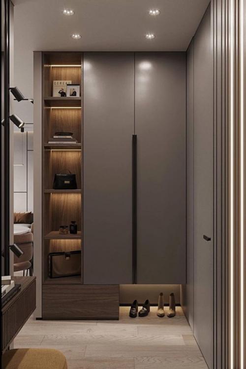 Интерьер прихожей. Выполнен в приятном серо-коричневом оттенке.