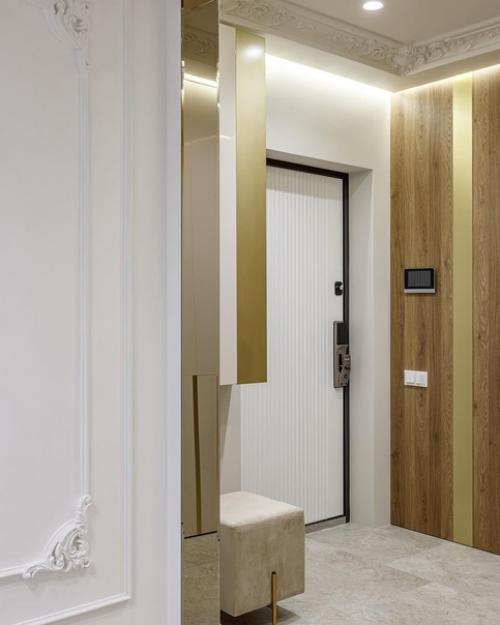 Светлый и воздушный интерьер, украшенный гипсовой лепниной и натуральным камнем. 04