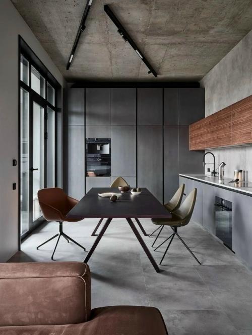 Этот интерьер - прекрасный пример того, как можно соединить брутальность индустриального стиля с ощущением домашнего тепла и уюта. 06