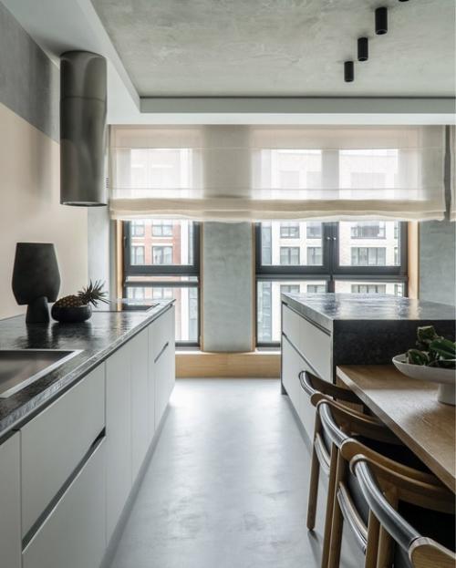 Сдержанная цветовая гамма, минимум мебели и максимум тактильных впечатлений от соприкосновения с натуральным деревом, стеклом, металлом. 03