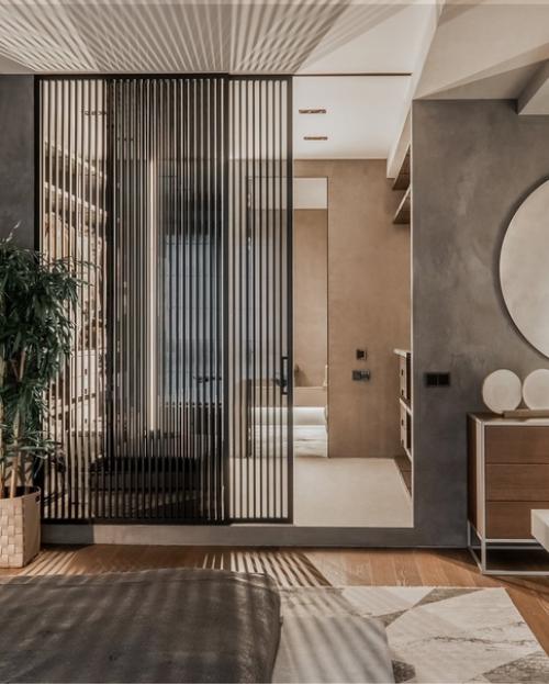 Сдержанная цветовая гамма, минимум мебели и максимум тактильных впечатлений от соприкосновения с натуральным деревом, стеклом, металлом. 06