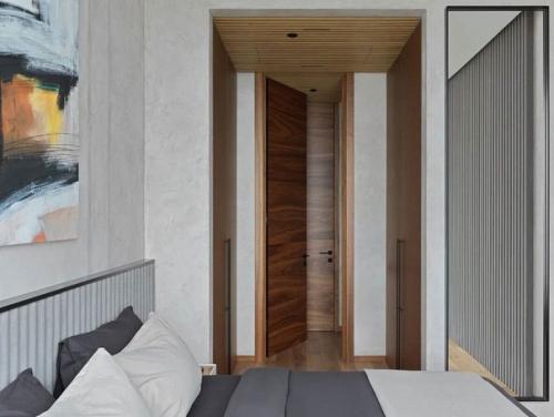 Апартаменты в высотке.  Удобный и комфортный интерьер для проживания одного человека. 05