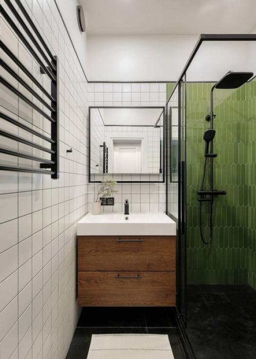 Подружить сканди, эко и минимализм с черными элементами так, чтобы квартира осталась светлой и уютной, кажется не самой простой задачей. 07