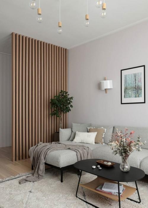 Подружить сканди, эко и минимализм с черными элементами так, чтобы квартира осталась светлой и уютной, кажется не самой простой задачей. 03