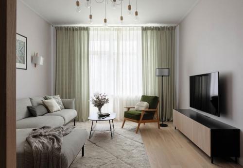 Подружить сканди, эко и минимализм с черными элементами так, чтобы квартира осталась светлой и уютной, кажется не самой простой задачей. 02