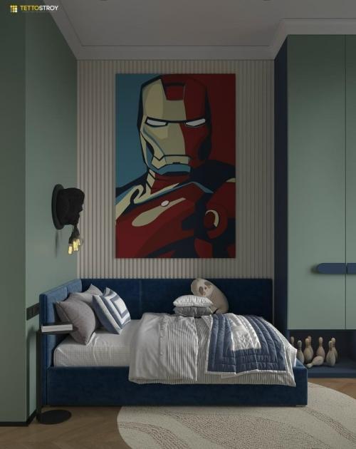 Интерьер детской комнаты выполнен в современном и сдержанном стиле с яркими акцентами, отражающими интересы ребёнка. 02