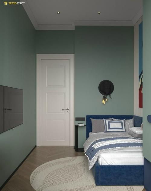 Интерьер детской комнаты выполнен в современном и сдержанном стиле с яркими акцентами, отражающими интересы ребёнка. 03