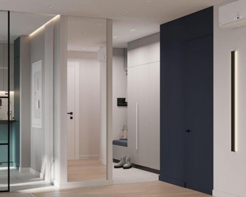 Прихожая, выполненная в светлых тонах с добавлением зеленых и синих акцентов. 02