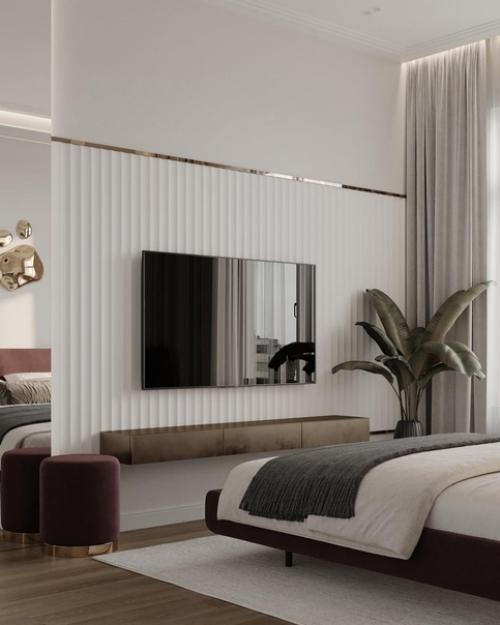 Светлая и просторная и с очень необычным декором на стене спальная комната. 04