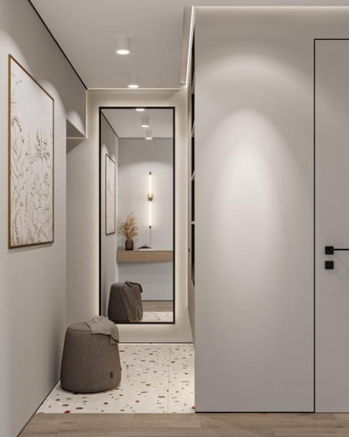 Приятное сочетание цветов без лишних деталей, а также много света, как естественного, так и искусственного, что делает квартиру более просторней. 04