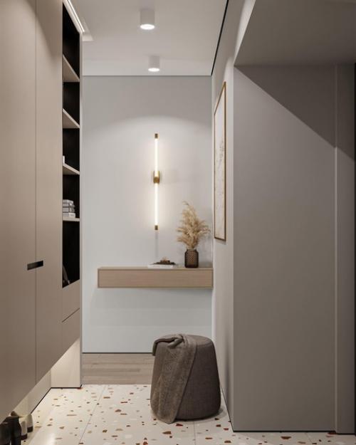 Приятное сочетание цветов без лишних деталей, а также много света, как естественного, так и искусственного, что делает квартиру более просторней. 06