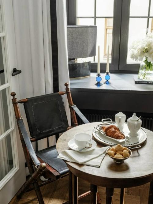 Эта квартира - настоящий пример того, как даже на небольшой площади можно создать гармоничное и уютное пространство. 09