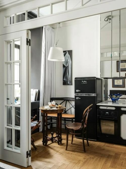 Эта квартира - настоящий пример того, как даже на небольшой площади можно создать гармоничное и уютное пространство. 05