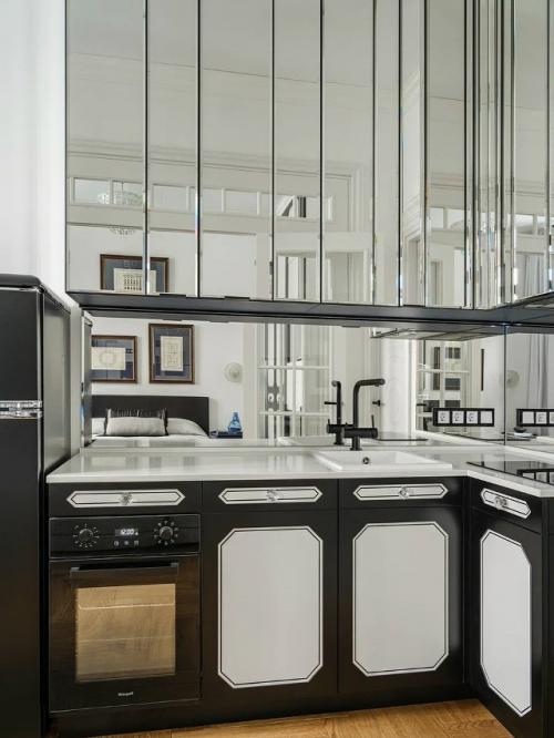 Эта квартира - настоящий пример того, как даже на небольшой площади можно создать гармоничное и уютное пространство. 06