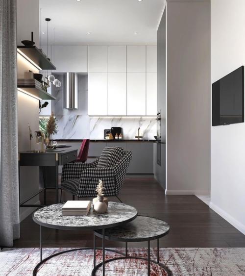 Кухня - гостиная в этом интерьере разбита на четыре зоны: зона готовки, обеденная группа, место для работы и уголок для отдыха. 02