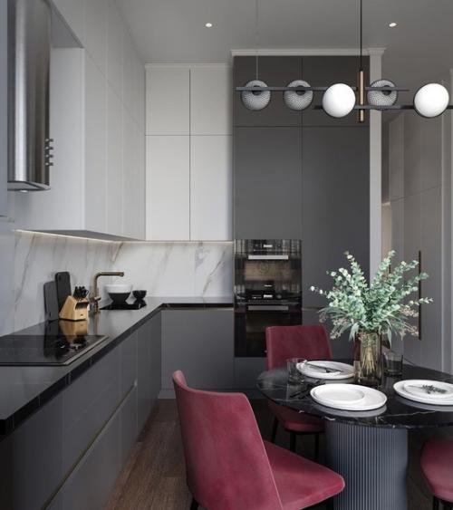 Кухня - гостиная в этом интерьере разбита на четыре зоны: зона готовки, обеденная группа, место для работы и уголок для отдыха.