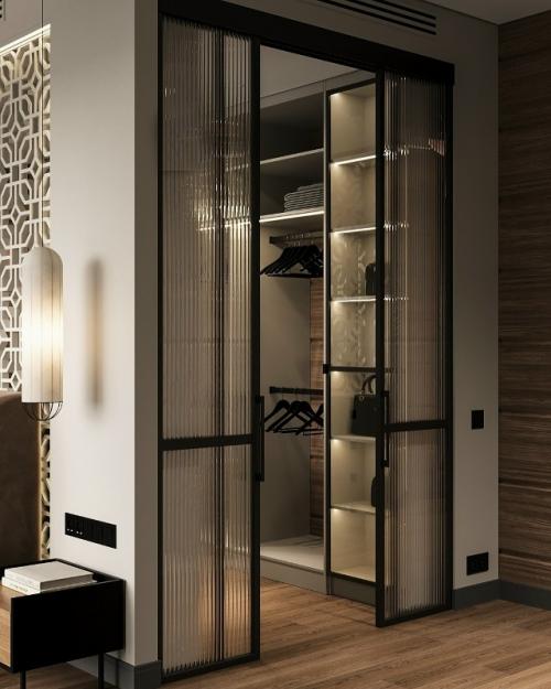 Современный интерьер выполнен в элегантной и сдержанной стилистике с акцентом на благородные материалы и продуманную геометрию пространства. 07