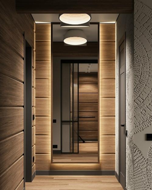 Современный интерьер выполнен в элегантной и сдержанной стилистике с акцентом на благородные материалы и продуманную геометрию пространства. 09