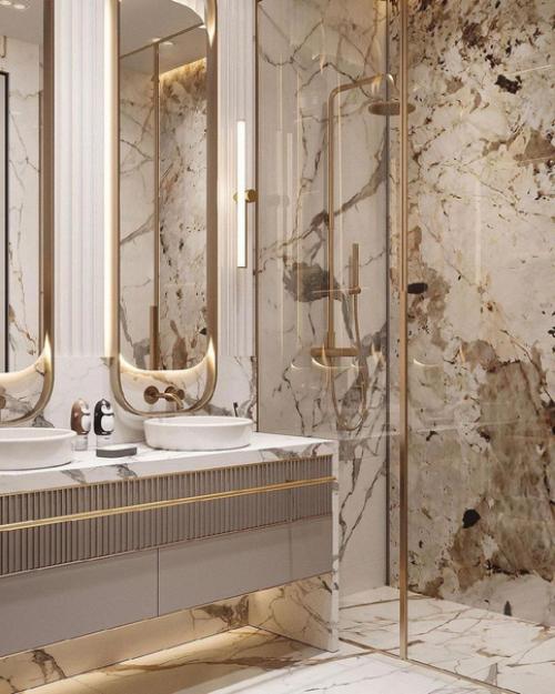 Стильный санузел.  Золото на фоне белого мрамора выделяется. 03