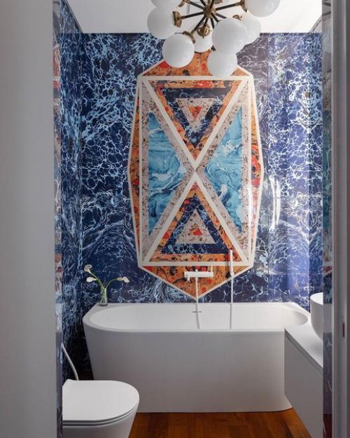 Именно яркие акценты и декор сделали интерьер этой квартиры стильным и необычным. 06