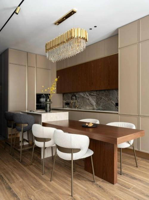 Этот проект - пример того, как дизайнер смог превратить квартиру с неудобной планировкой в комфортное и элегантное пространство для молодой семьи. 04