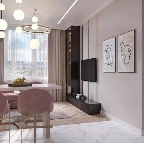 Кухня - гостиная в пудровых оттенках.